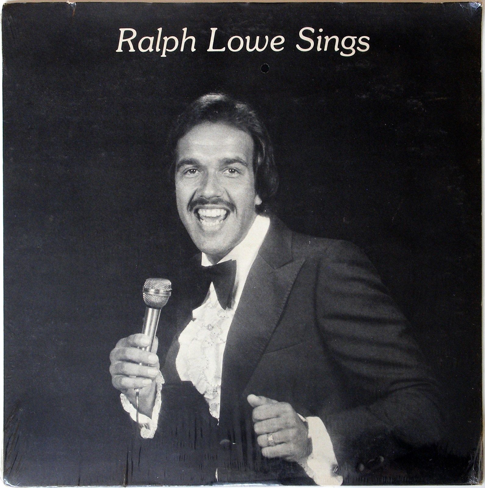 Shop Stupid Websites, Buy Stupid Products - Drunk Cat Presents the Carousel of Drunk Products - Self Published Airport Lounge Singer Ralph Lowe